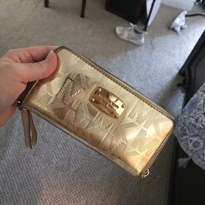 Gold Michael Kors wristlet